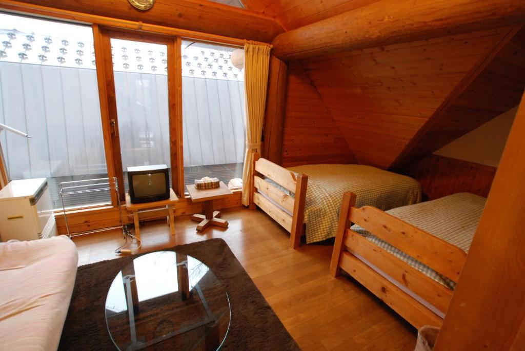 Pension Woody Note Niseko Zimmer foto